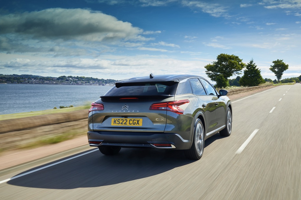 Citroen C5X PHEV,Grey, Action shot, Rear three angles